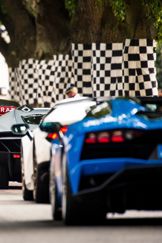 ***FREE TO USE***Supercars wait to do their run up the Hillclimb at the Goodwood Festival of Speed