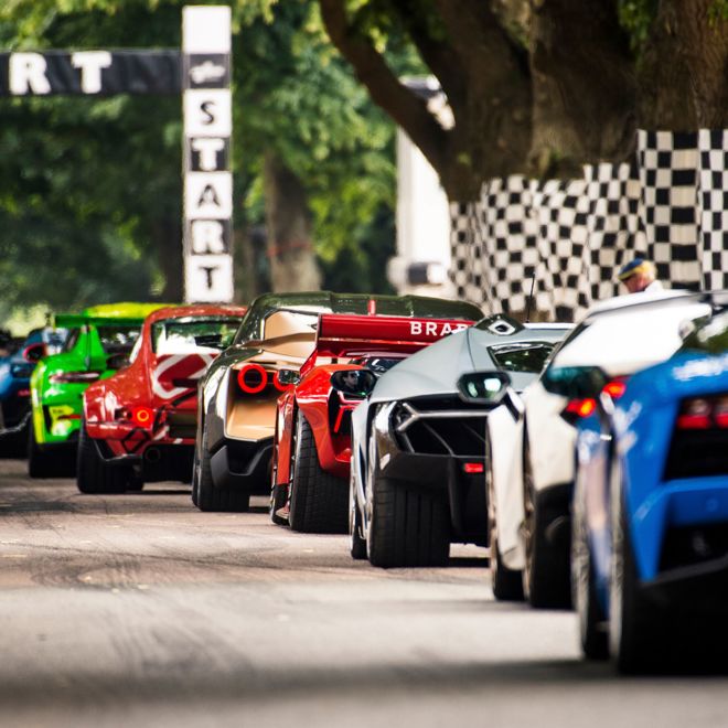 ***FREE TO USE***Supercars wait to do their run up the Hillclimb at the Goodwood Festival of Speed
