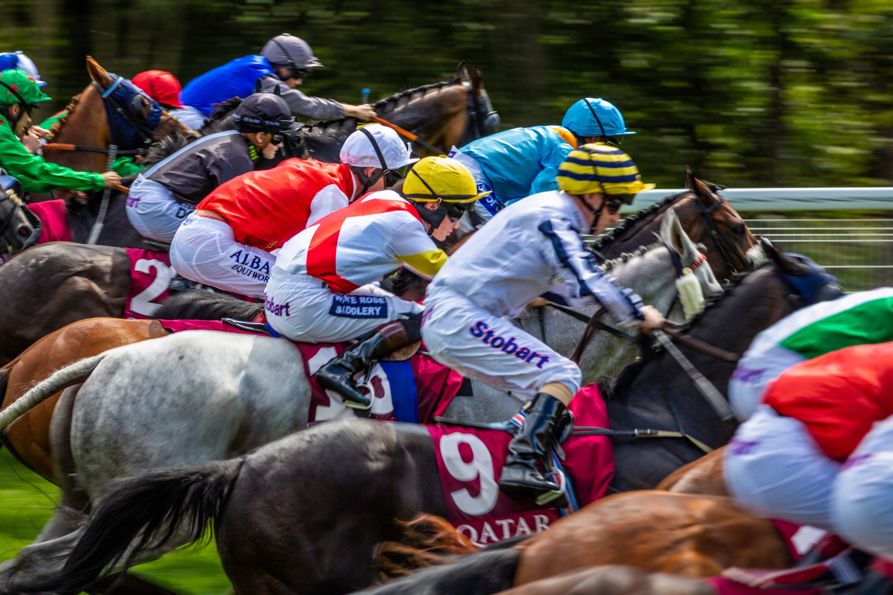 The start of the Qatar Stewards' Sprint Handicap Sprint on the fifth and final day of the Qatar Goodwood Festival 2018, QGF..Picture date: Wednesday July 2, 2014..Photograph by Christopher Ison ©.07544044177.chris@christopherison.com.www.christopherison.com