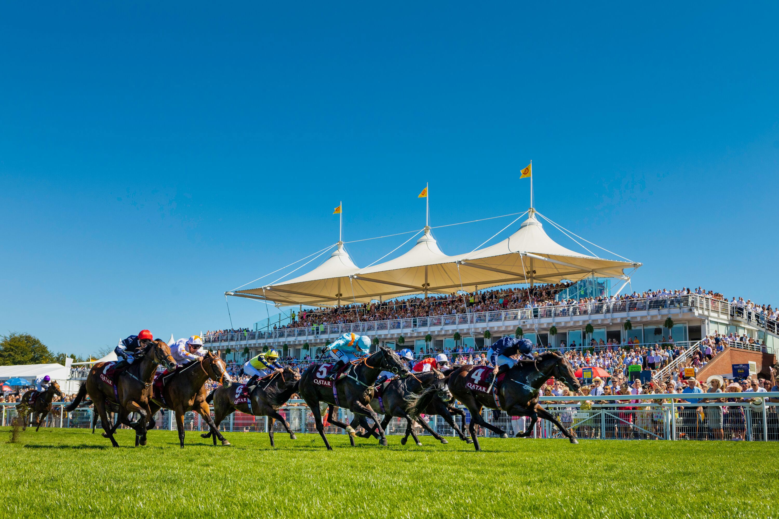 Ryan Moore on Land Force (4) winning the Qatar Richmond Stakes on Ladies' Day on the third day of the Qatar Goodwood Festival 2018 (QGF)..Picture date: Thursday August 2, 2018..Photograph by Christopher Ison ©.07544044177.chris@christopherison.com.www.christopherison.com