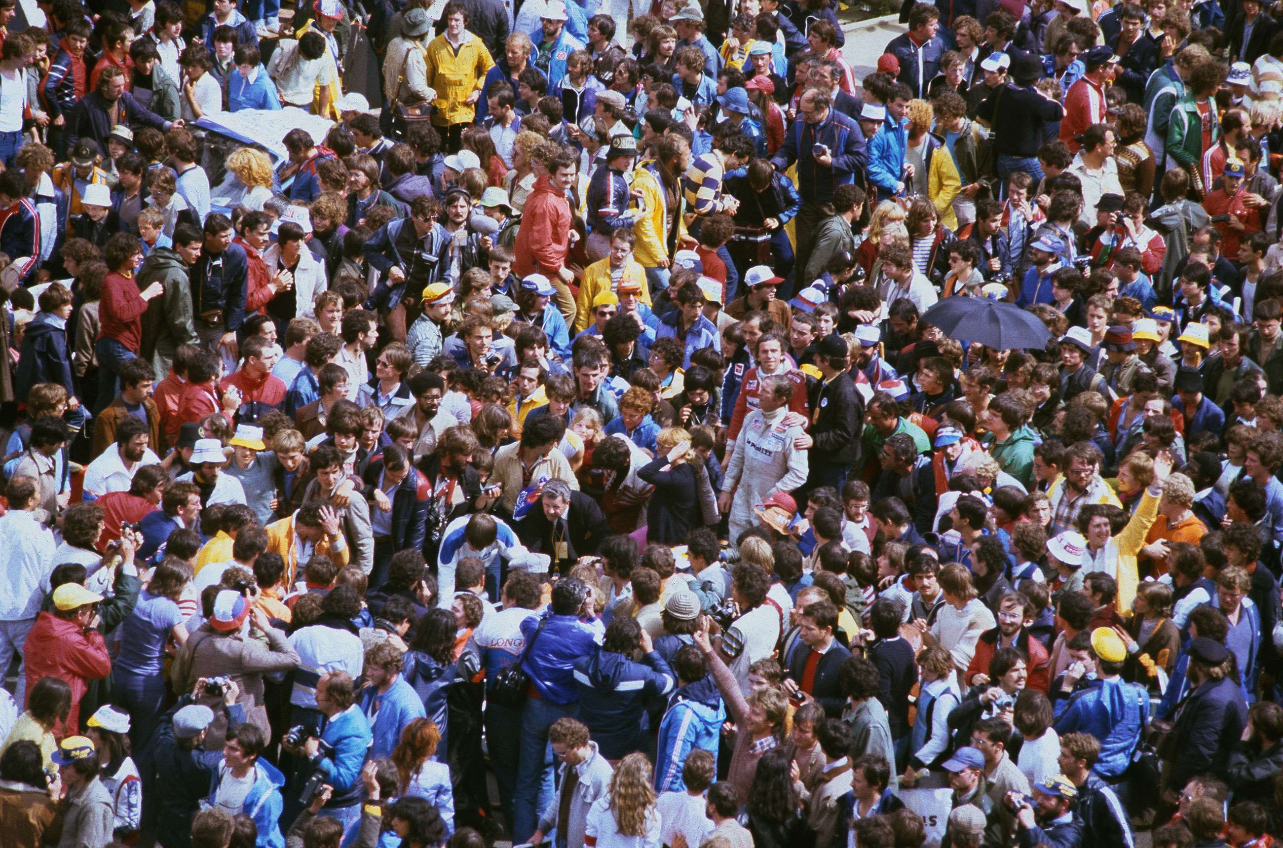 Post-race mob, Le Mans, 1980. Spot the winners Jean Rondeau and Jean-Pierre Jaussaud – they're in there somewhere...