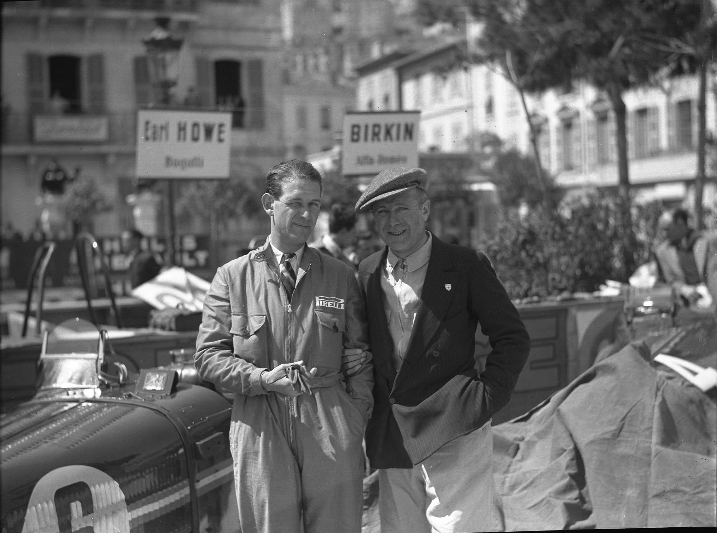 Toffs together - Raymond Sommer of France (left) - Francis, Earl Howe (right) in the pits at Monaco 1933