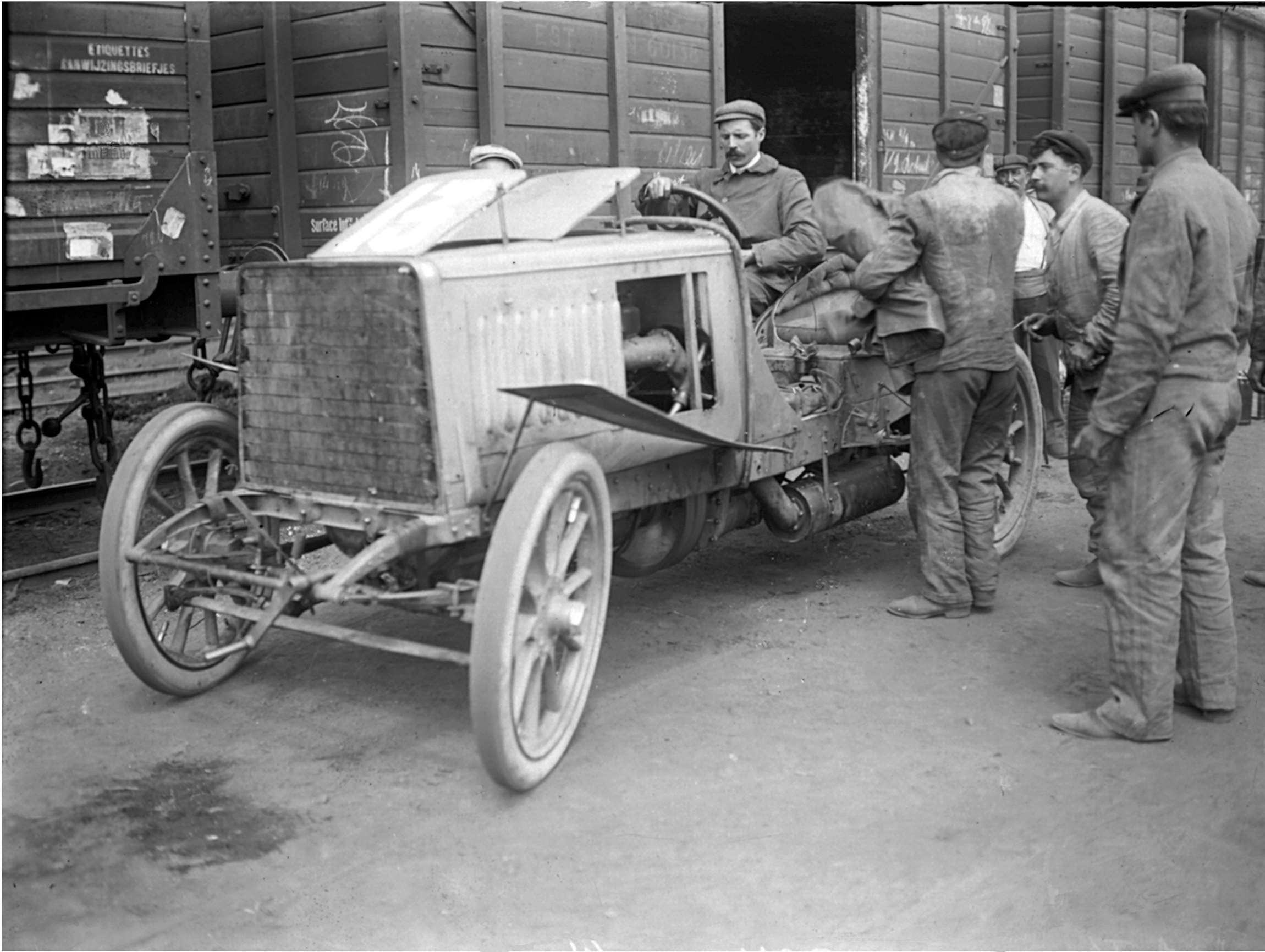 Heroic Age of the heavyweight big-banger racing car - Henri Farman’s Panhard after being unloaded from the Paris train in the railway yard at Bastogne, Belgium