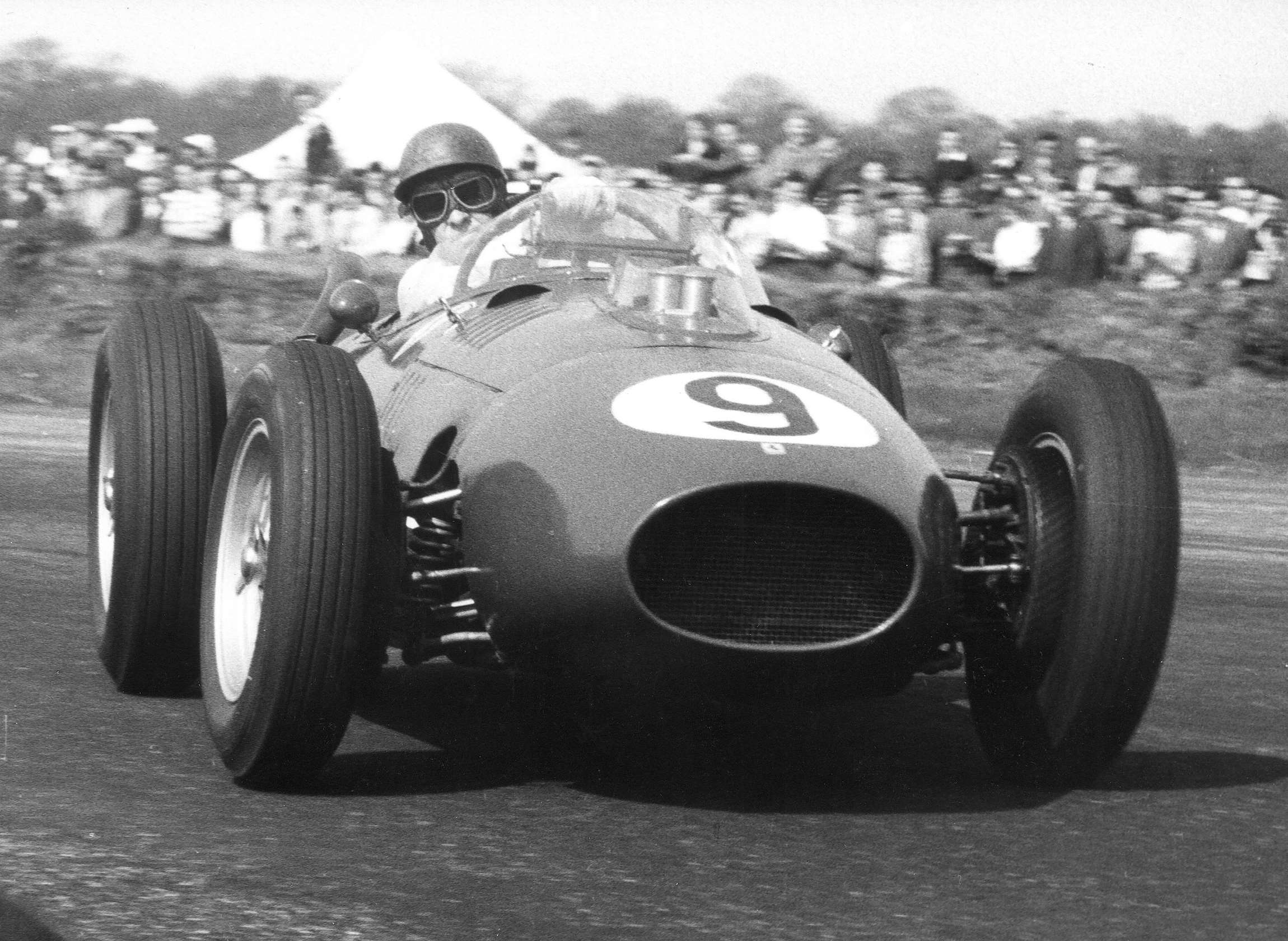 Peter Collins winning the 1958 BRDC International Trophy race at Silverstone in his works Ferrari Dino 246
