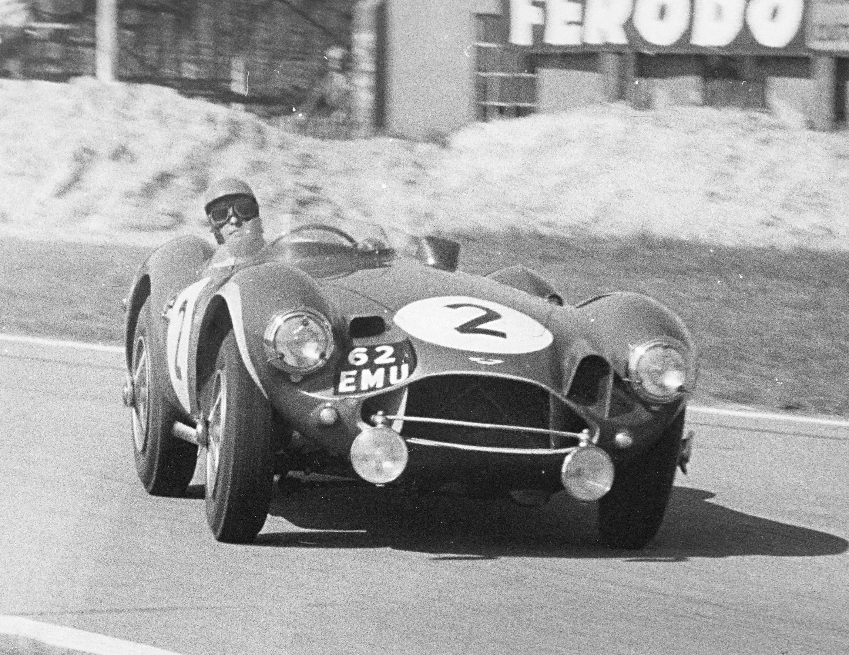 Peter Collins at speed in the works Aston Martin DB3S in the 1955 Goodwood 9-Hours - the last edition run.