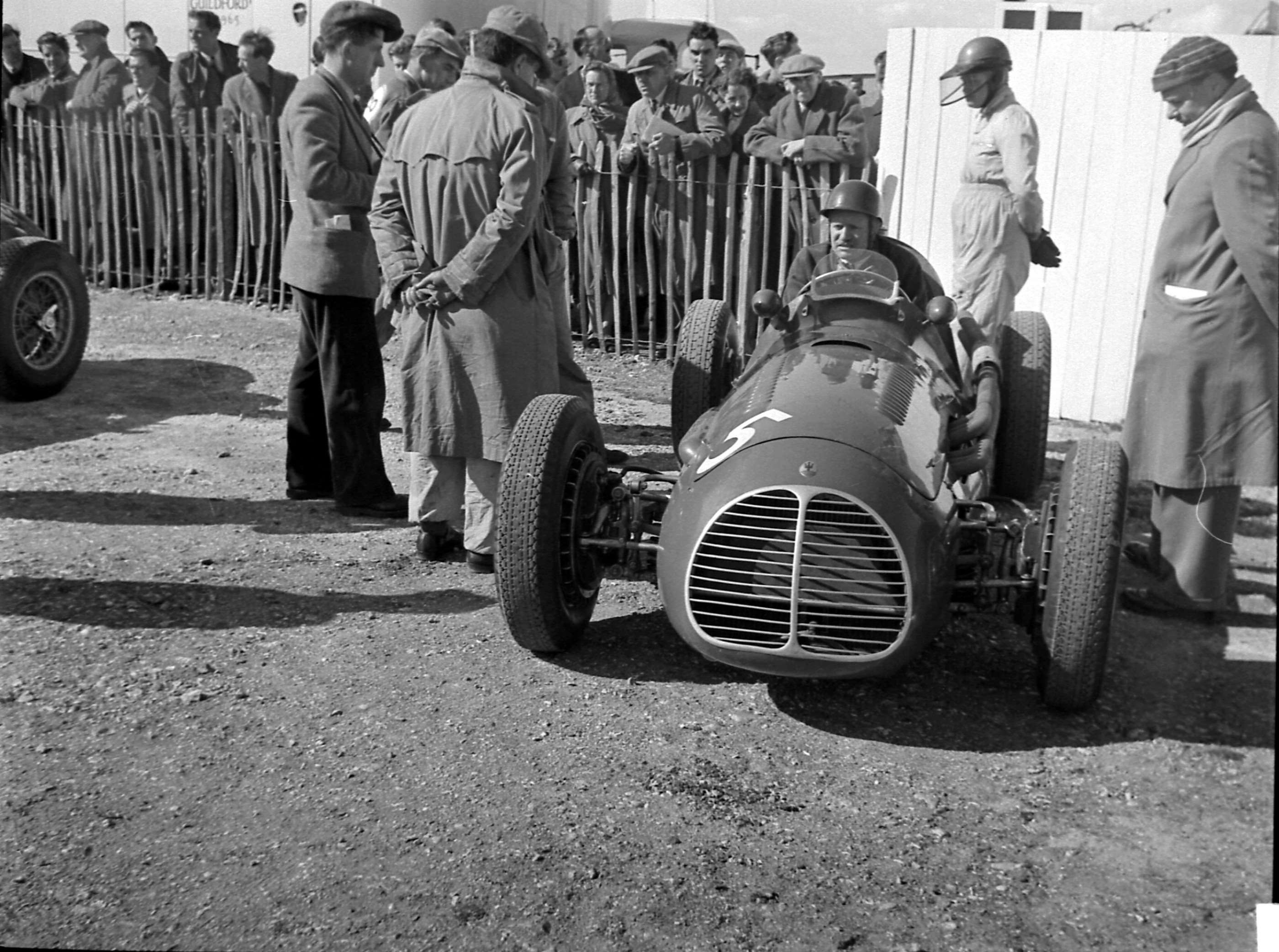 All geared-up and ready to race - the Swiss Baron in his Maserati A6GCM, the Goodwood assembly area, 1953…