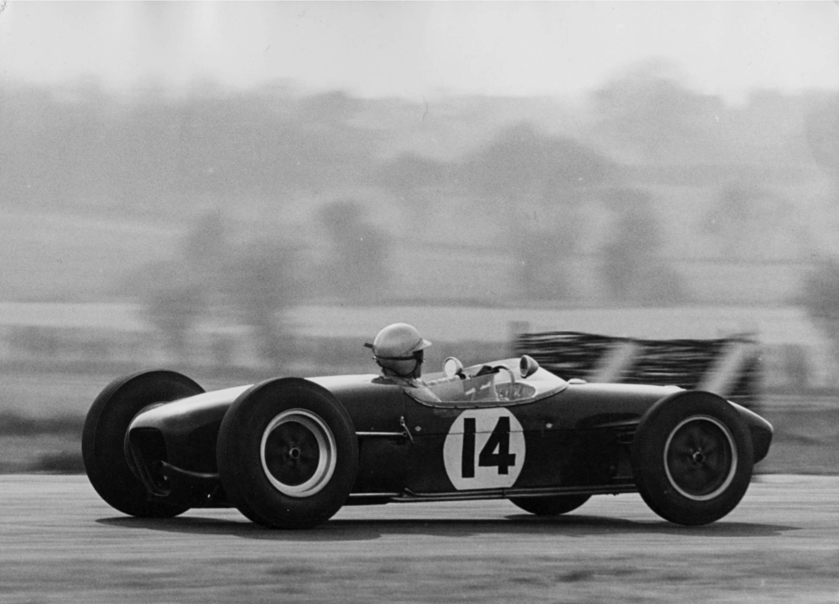 Catch me if you can!  Innes Ireland at full chat in the works Lotus-Climax 18 - Easter Monday 1960 - when he beat Moss’s Cooper in both Formula 1 and Formula 2 races…