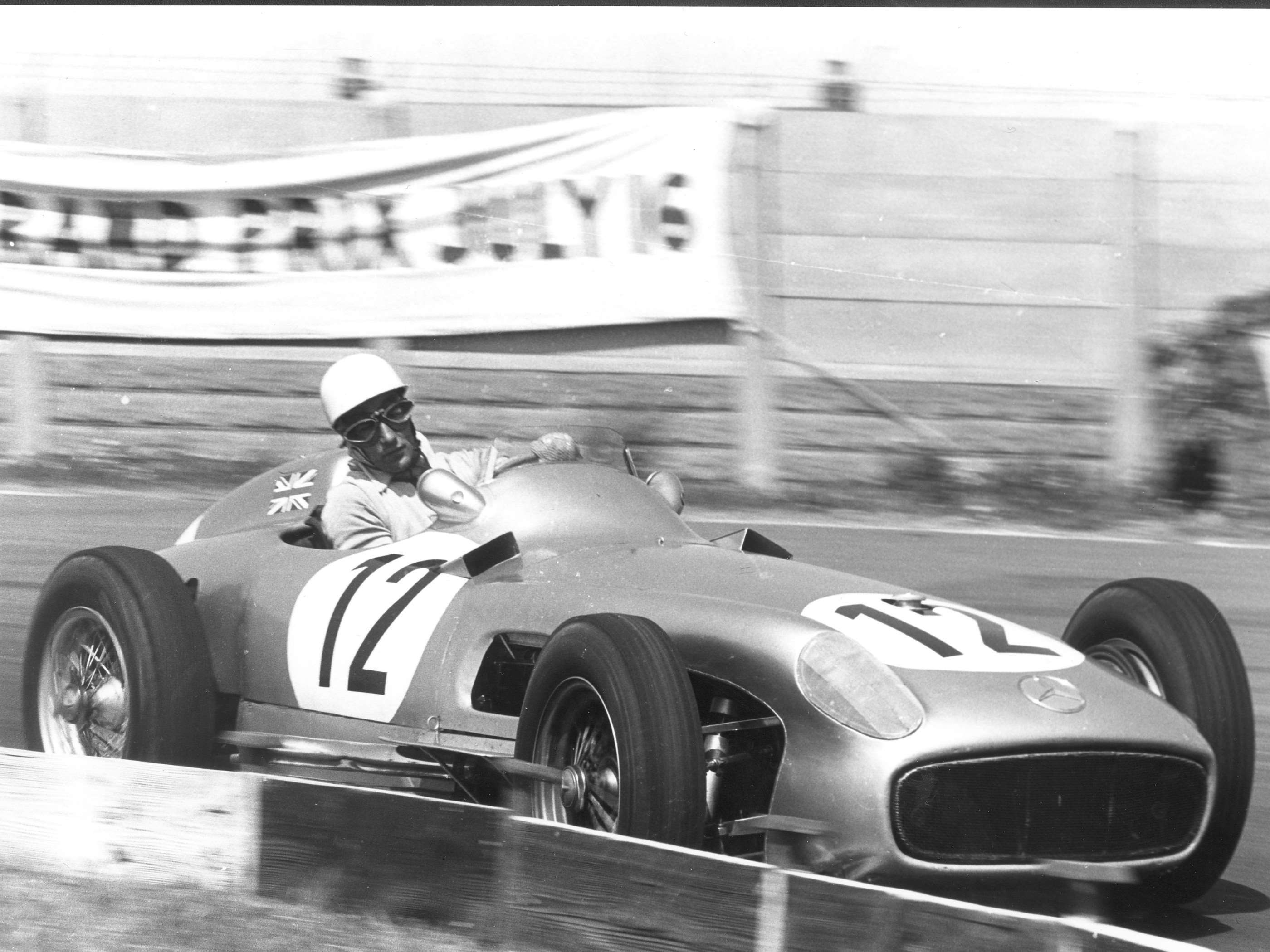 Stirling Moss broke his World Championship-qualifying Grand Prix duck driving for Mercedes-Benz, 1955 British GP at Aintree.