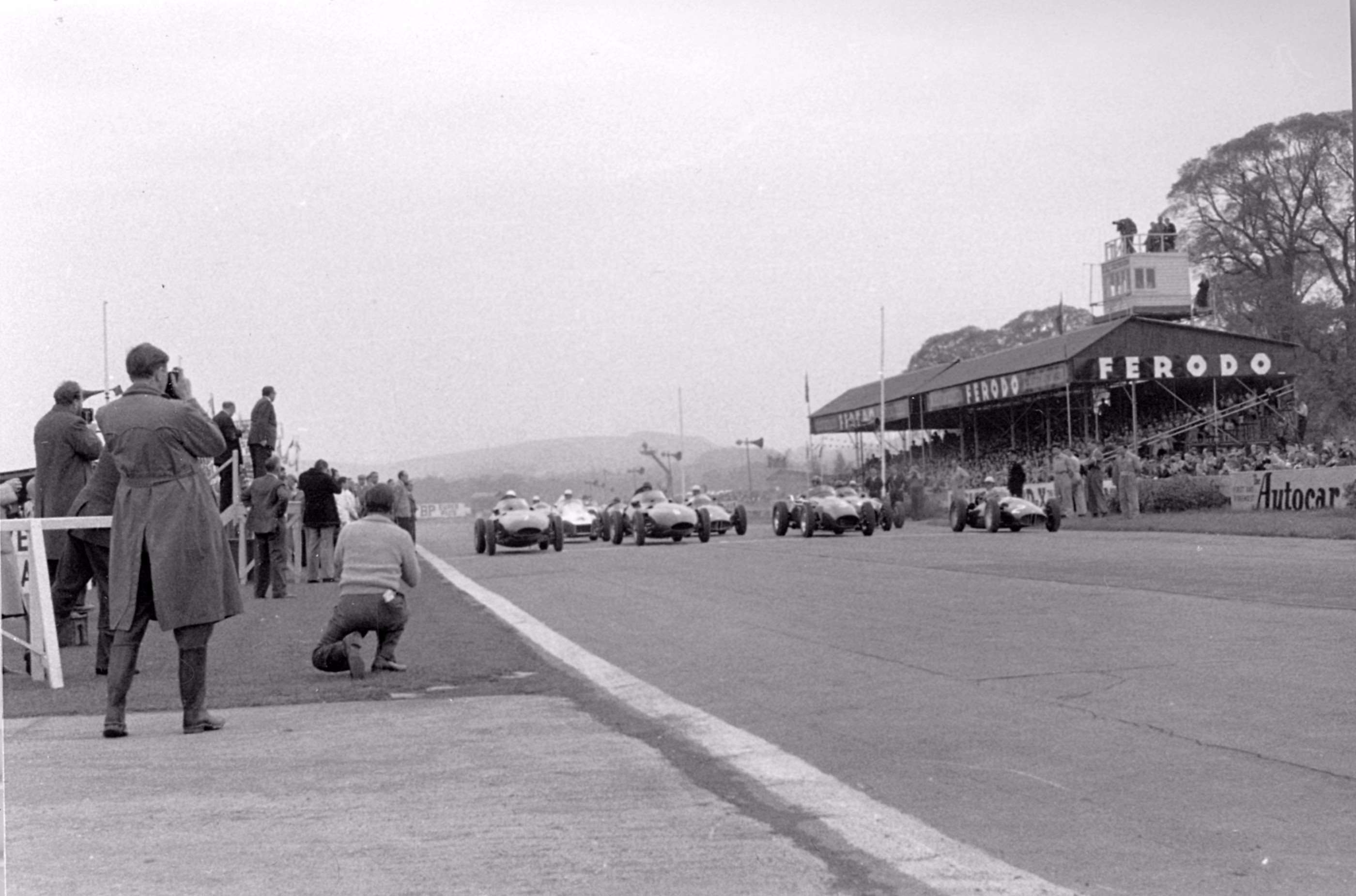 1957 Goodwood Easter Monday - the Vanwalls of Moss and Brooks 1-2 on the starting grid for the Glover Trophy feature Formula 1 race
