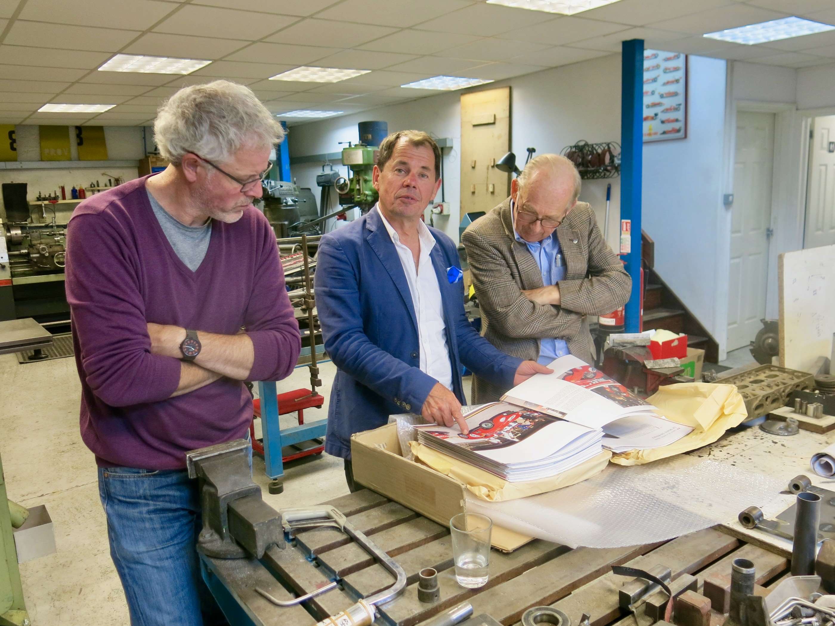 Mick Walsh of ‘Classic & Sportscar’ with the first Phil Hill book pages - publisher Paul Vestey right.