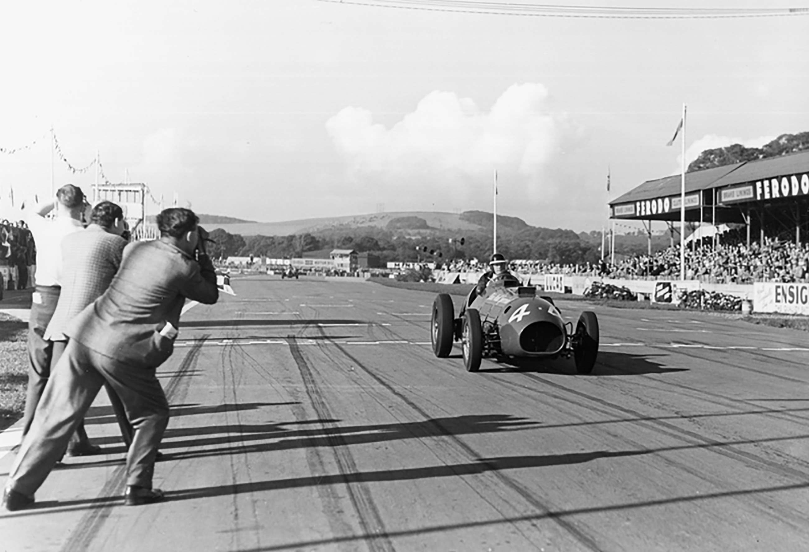 Mike winning in the ‘ThinWall Special' at Goodwood, 1954