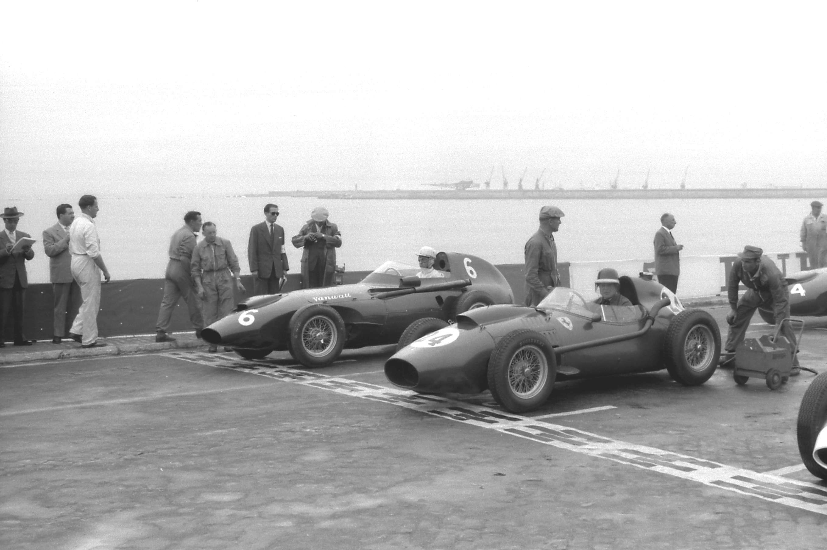 4 - Front row of the starting grid at Oporto - Hawthorn in his Ferrari on the middle slot, Stuart Lewis-Evans of Vanwall on the far side.