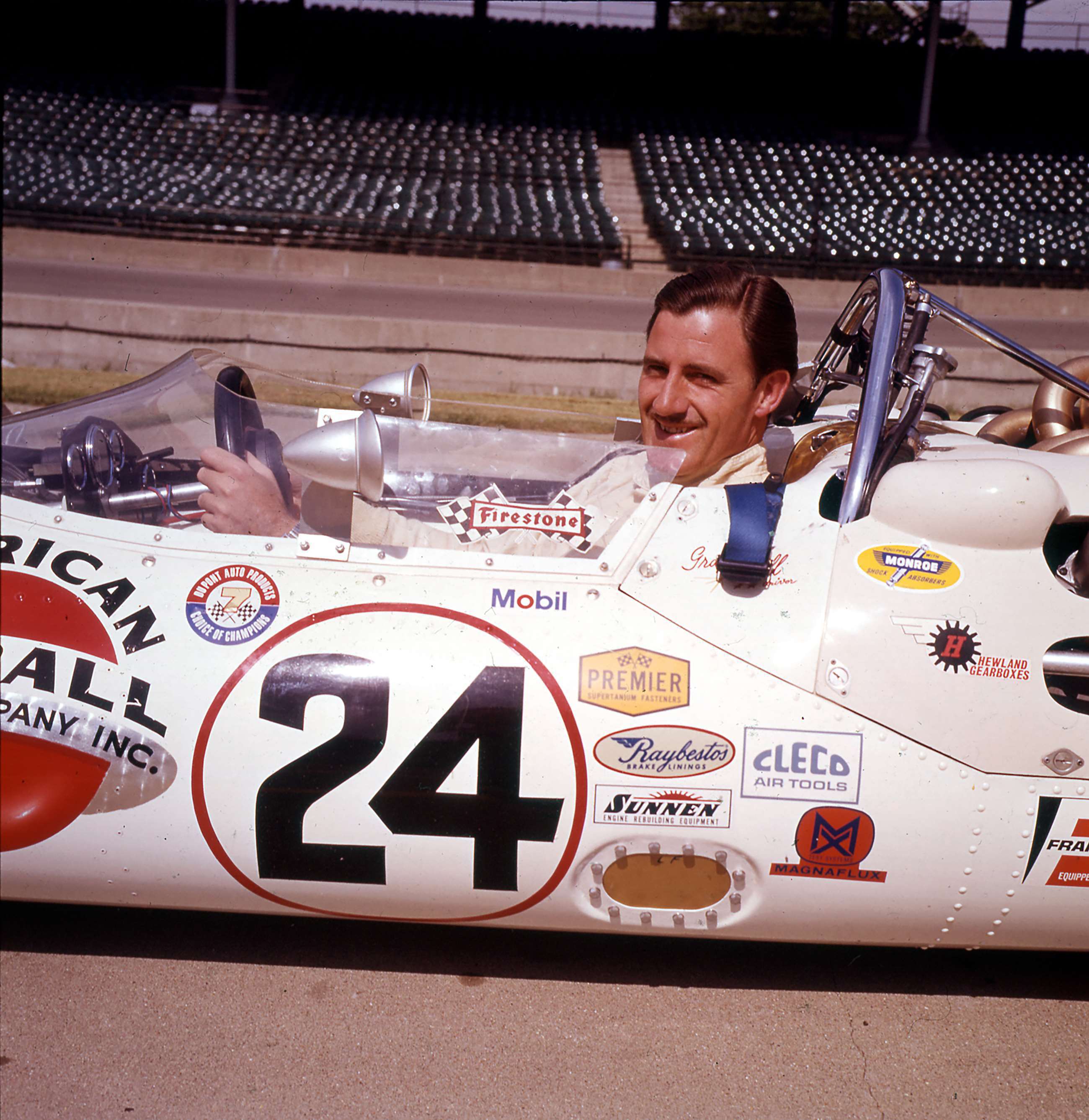 1962 World Champion Graham Hill in his 1966 Indianapolis 500-Miles-winning Lola-Ford T90 at ‘The Brickyard’.