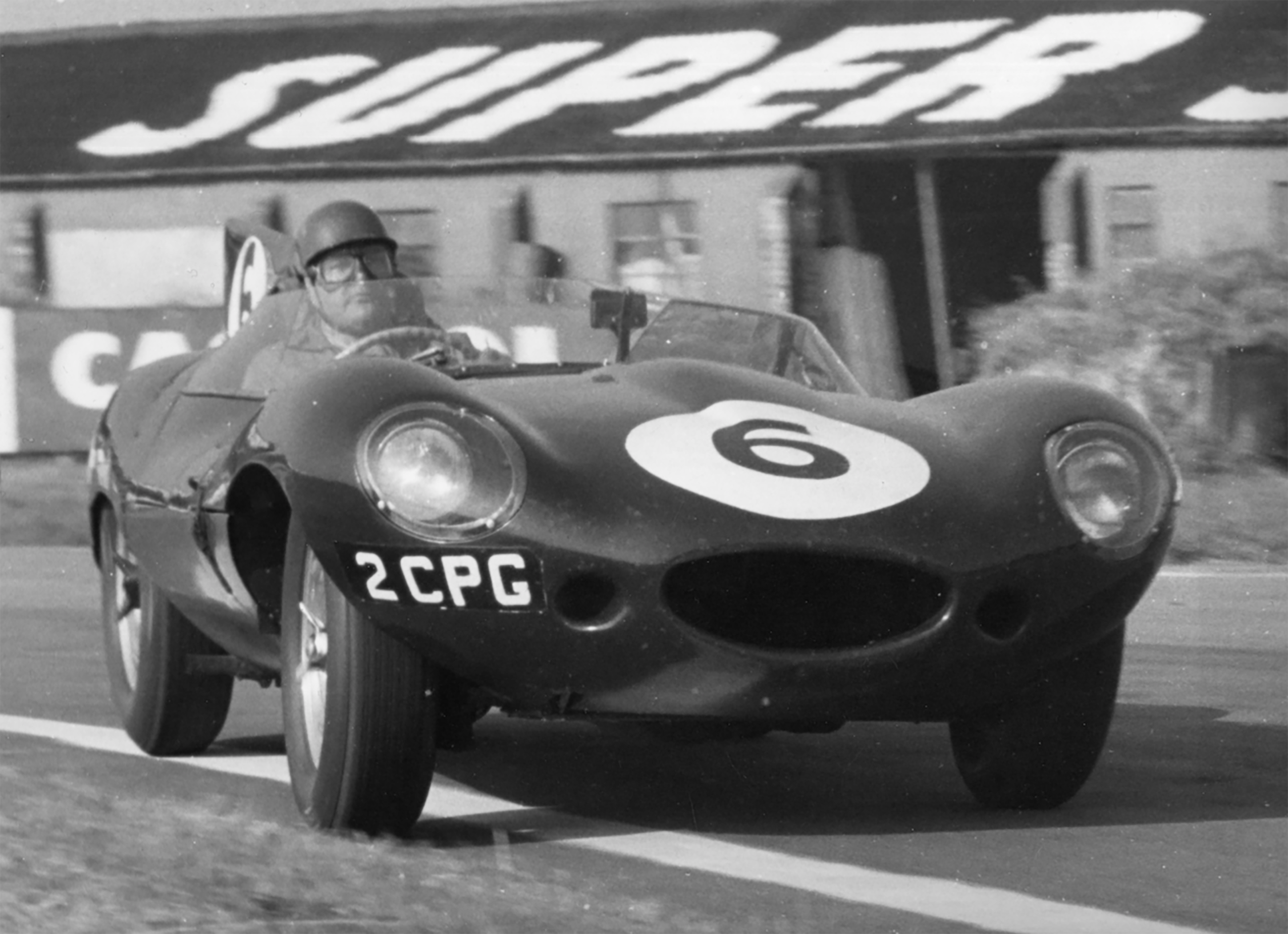 Another advocate of sideways driving - the rumbustious Duncan Hamilton in his ex-works ‘Longnose’ D-Type Jaguar - the type of car for which Dunlop Racing tyres had been tailored through the mid-1950s.