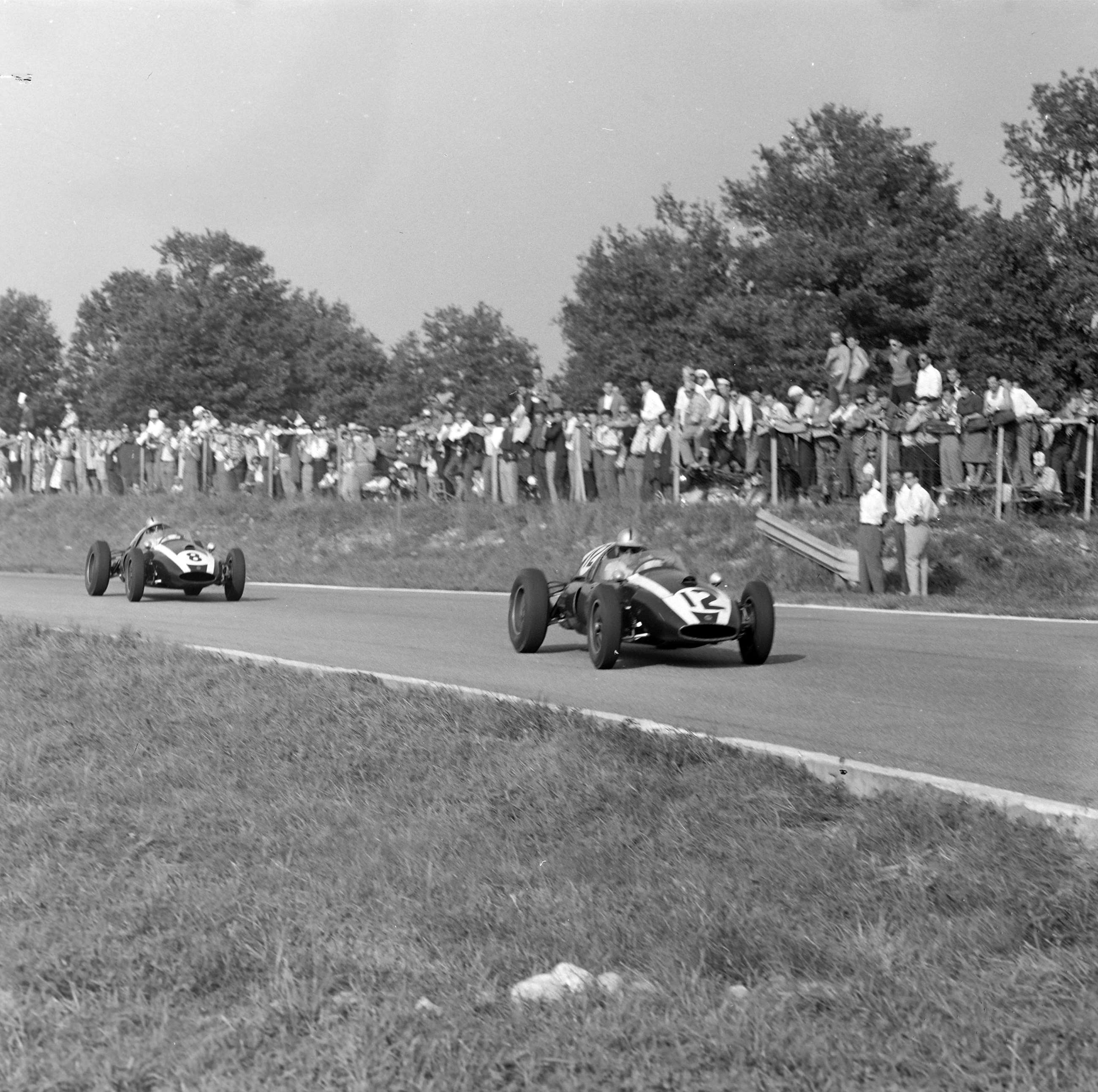 Bruce McLaren chasing Jack Brabham at Monza, 1959, both in Cooper T51 Climax.