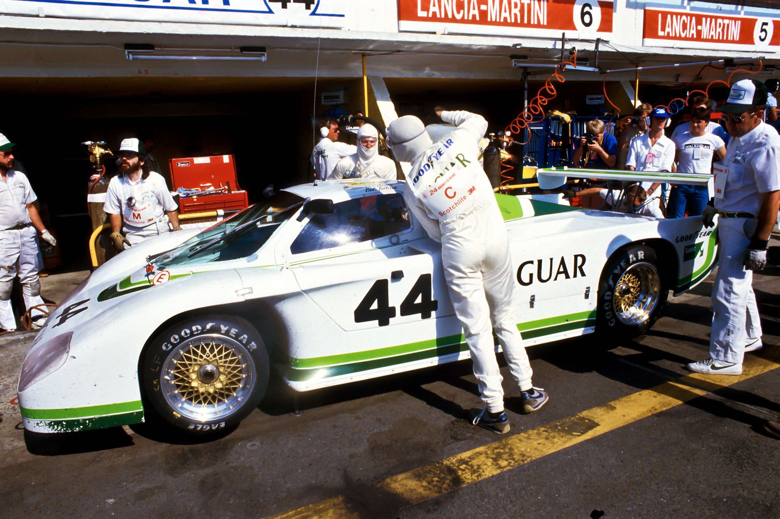 Le Mans, 1984. The Jaguar XJR-5 of Bob Tullius, Brian Redman and Doc Brundy stops for fuel.