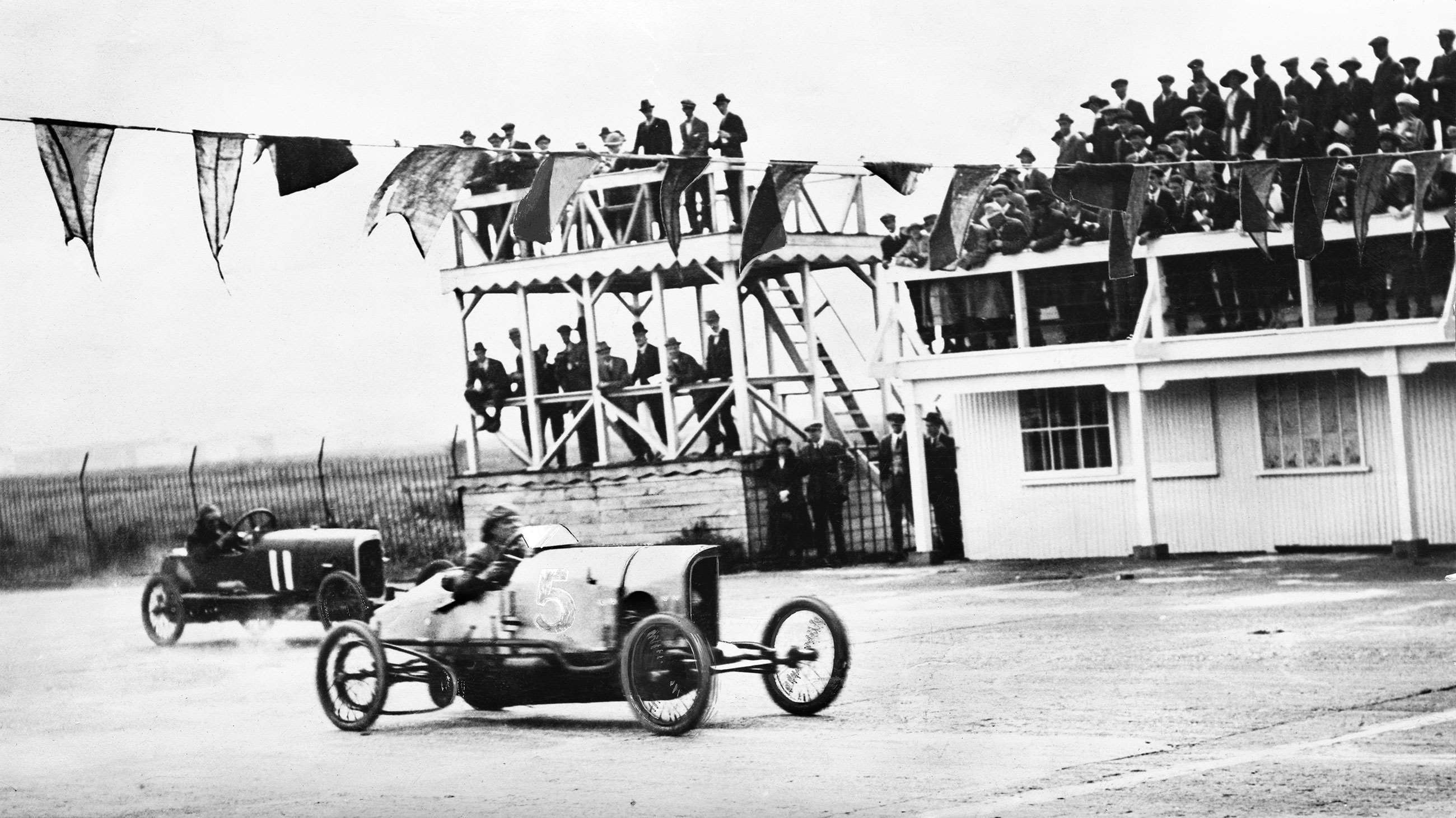 The Junior Car Club Meeting at Brooklands, May 20th 1920. H.R. Godfrey leads C. Finch.