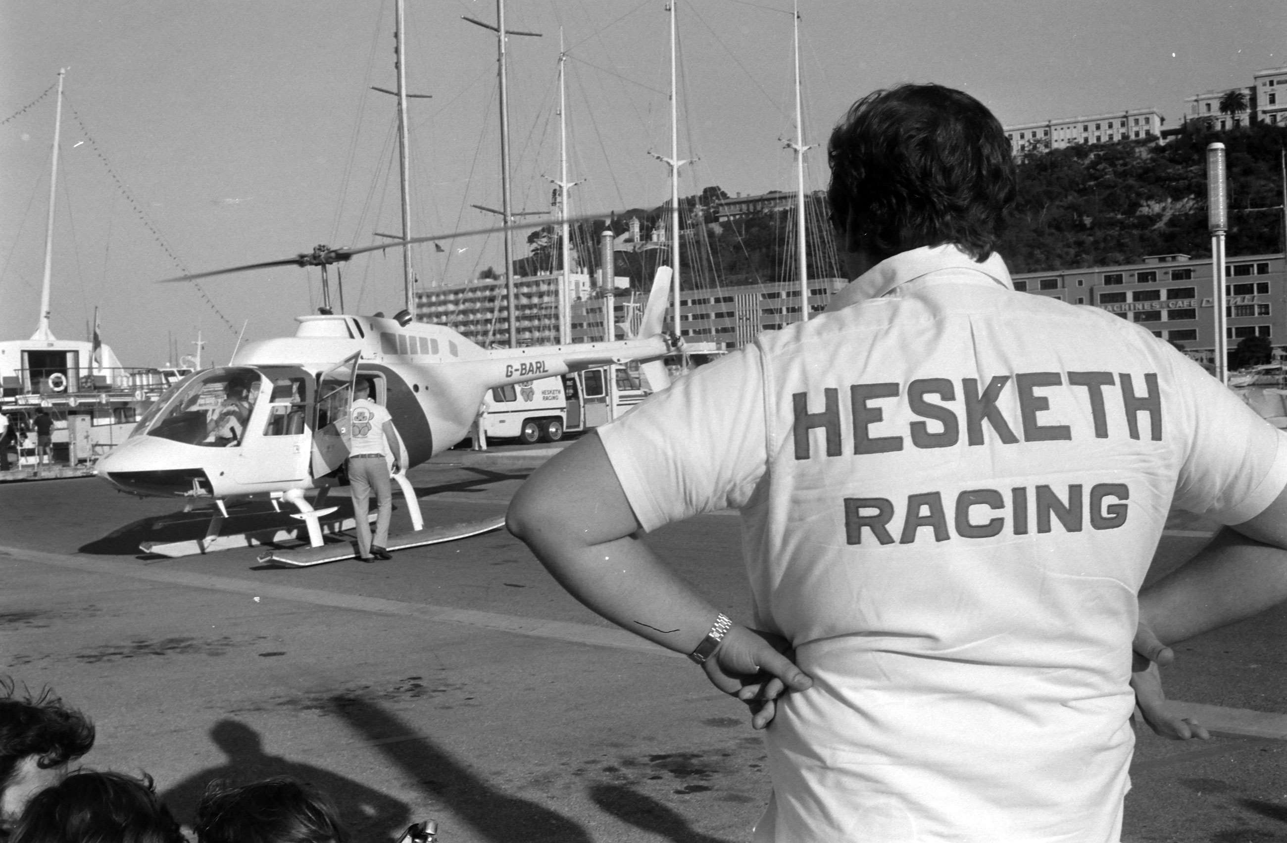 Lord Hesketh admiring his helicopter after the Grand Prix. 