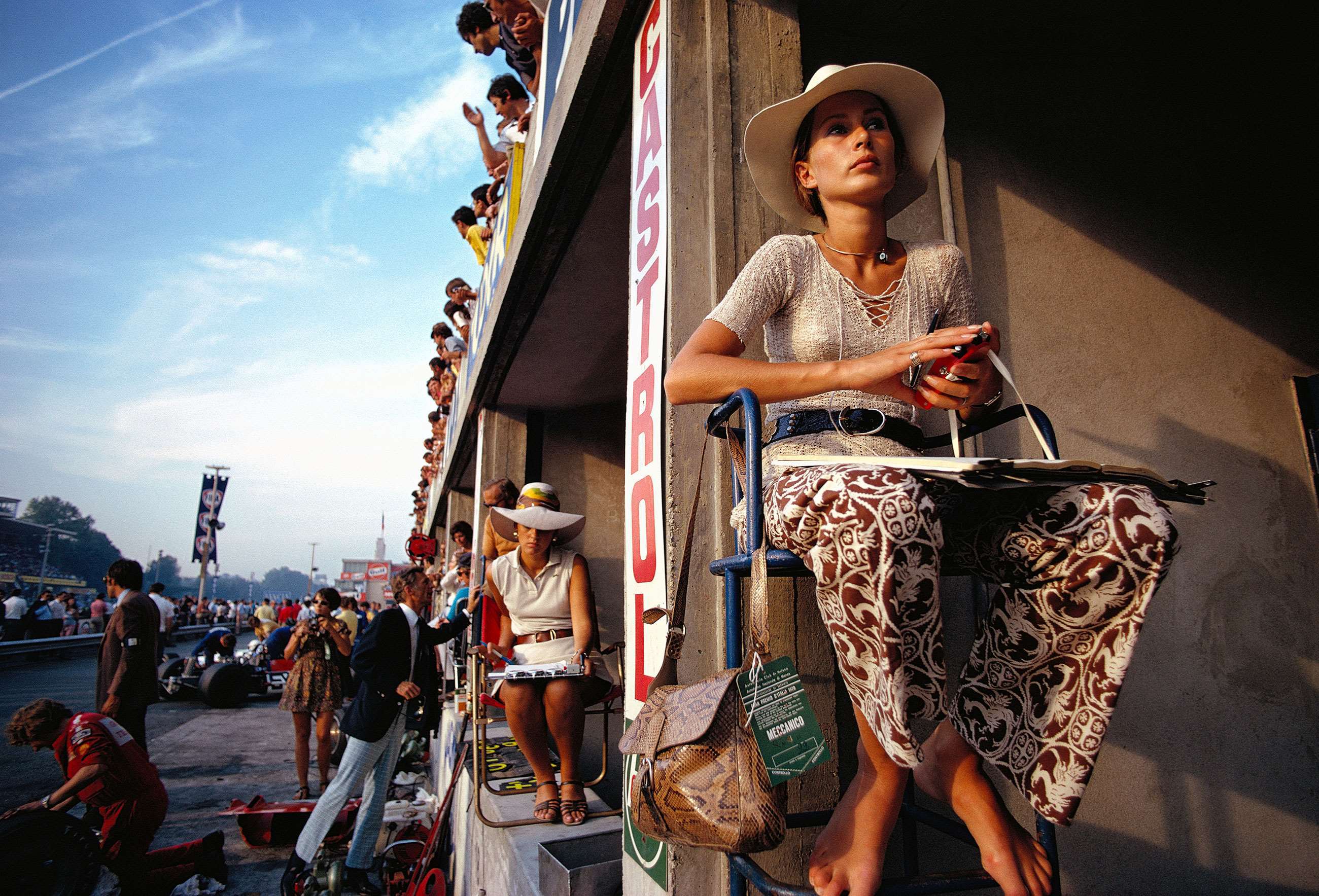 Nina Rindt, Jochen's wife, looking after Jochen's timekeeping during practice and waiting for him to pass back down the pit straight. Sadly he never did.