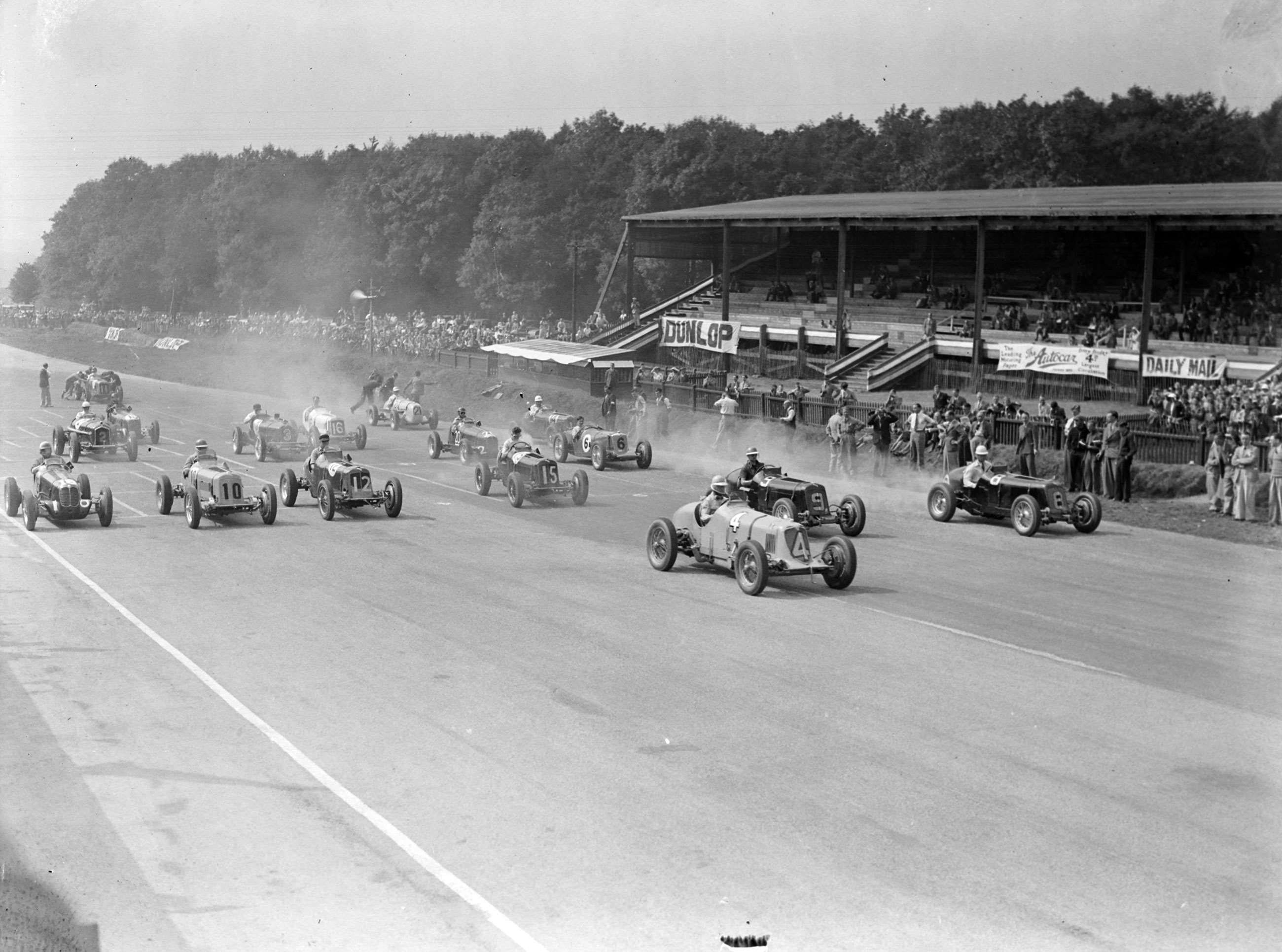 Donington Park, 1937, and the JCC 200 Miles. Prince Bira leads away from the line in his Maserati 8CM.