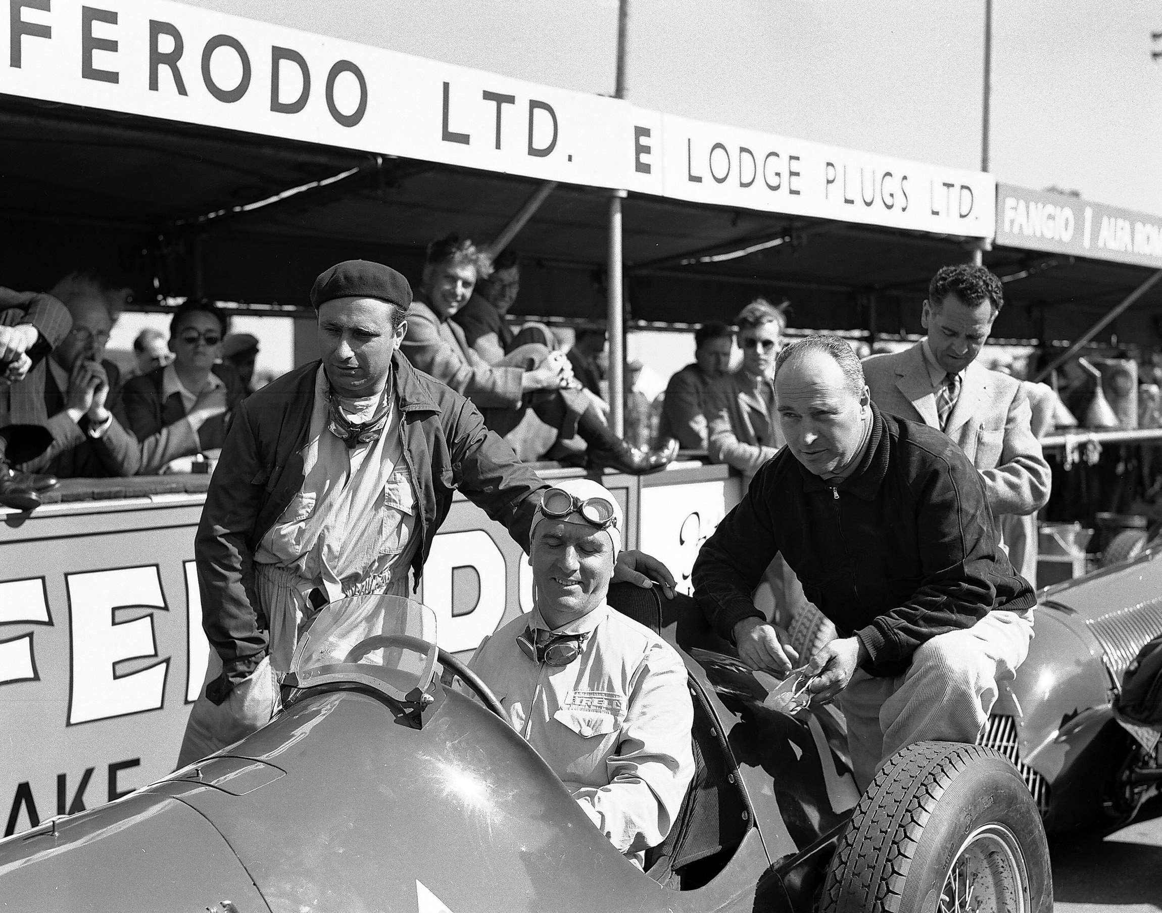 The works Alfa Romeo ‘Three Fs’ team 1950 - Fangio (beret), Farina (wind cap) and Fagioli (Mark 1 bald pate - right)