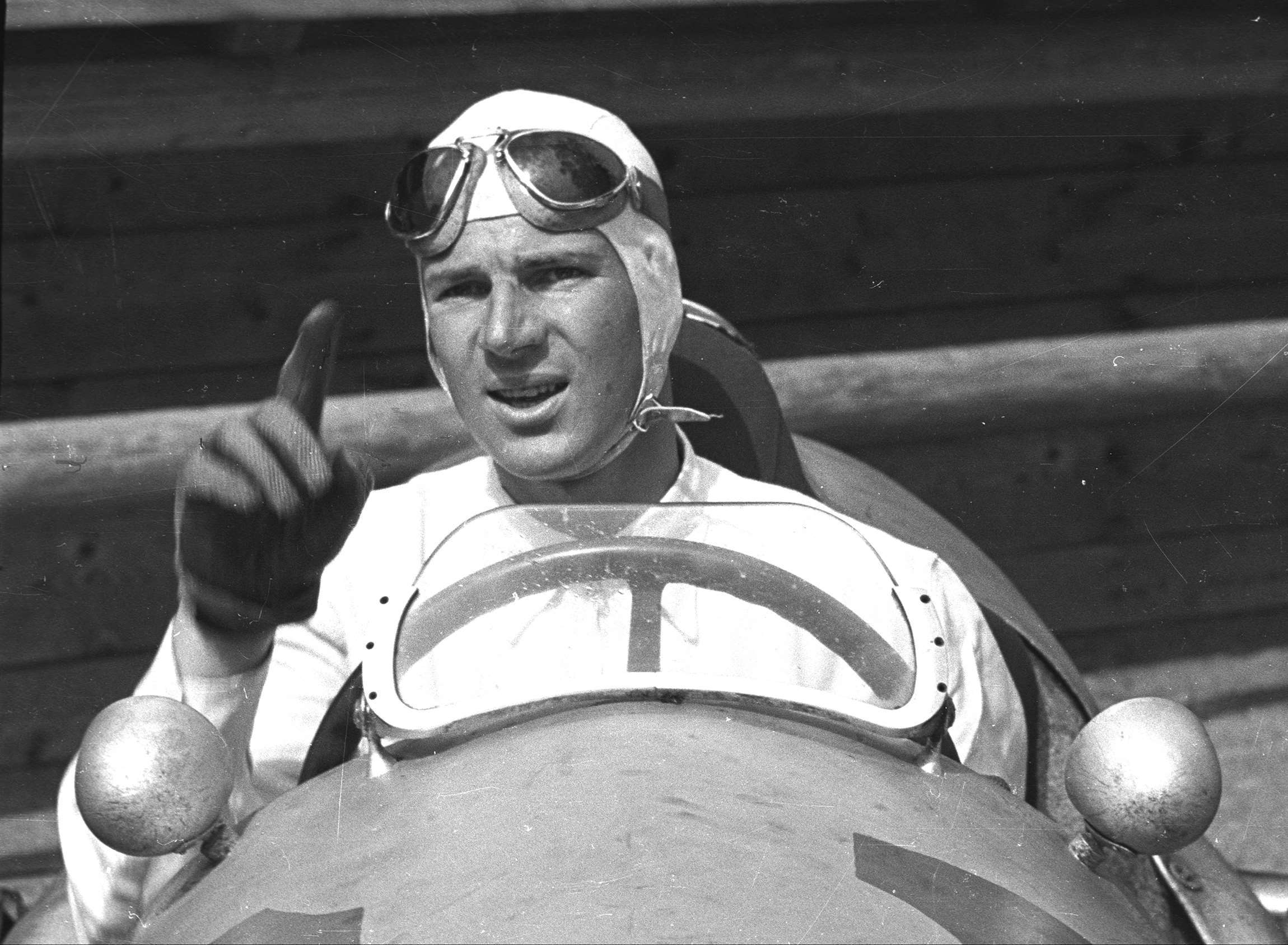 Bad example?  Britain’s best - Dick Seaman, winner of the 1938 German GP, with Mercedes-Benz - and no hard hat for this superstar…