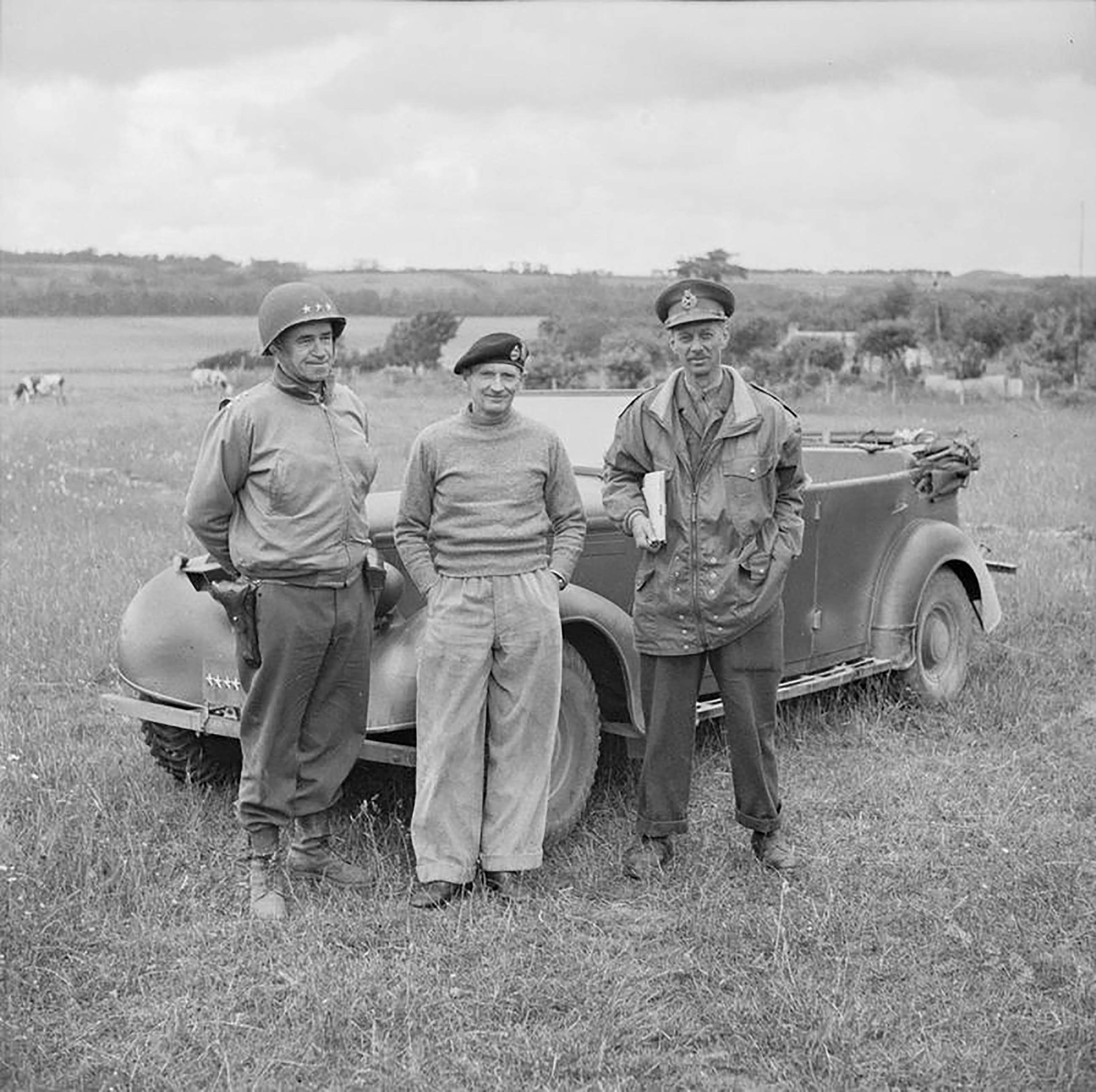 General Sir Bernard Montgomery, Lieutenant-General Miles Dempsey and Lieutenant-General Omar Bradley in front of Monty's Humber Super Snipe staff car, 10 June 1944.