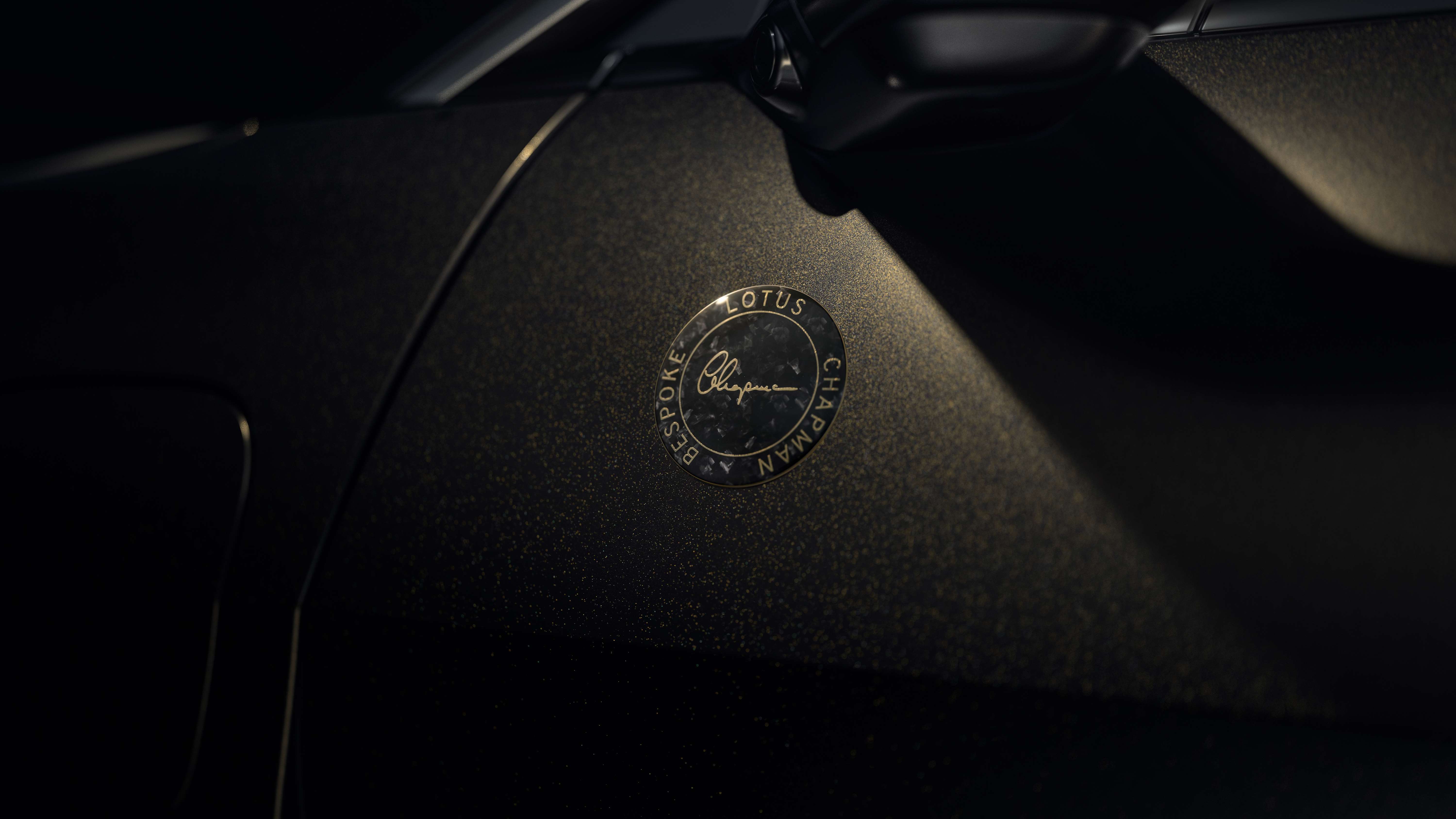 lotus_chapman_bespoke_eletre_bespoke_black_gold_badge_detail_200324.jpg