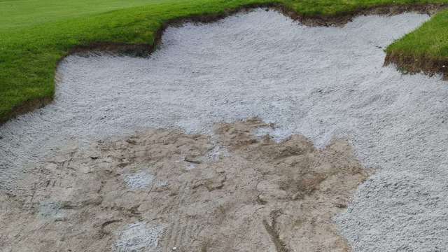 Contrast of new sand being added in