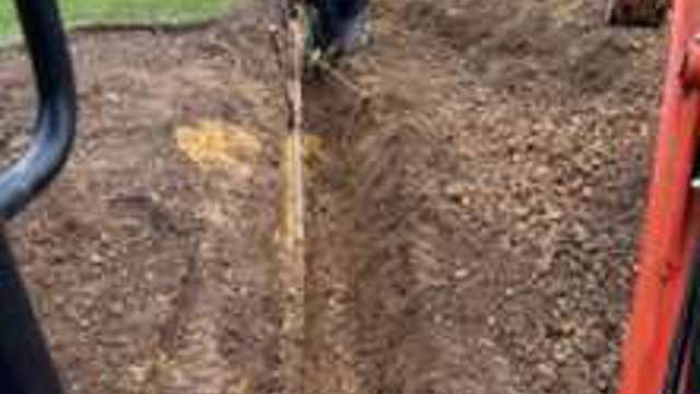 Danny working on moving the irrigation for the new bunker.