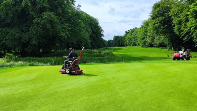 Ironing greens to keep the speeds consistent throughout the course