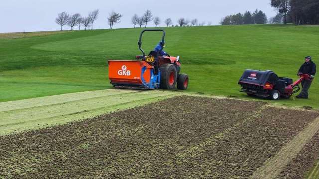 Greens Maintenance. GKB machine and hollow coring greens.