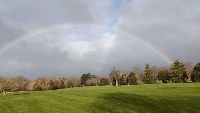 The course looking splendid under a rainbow.
