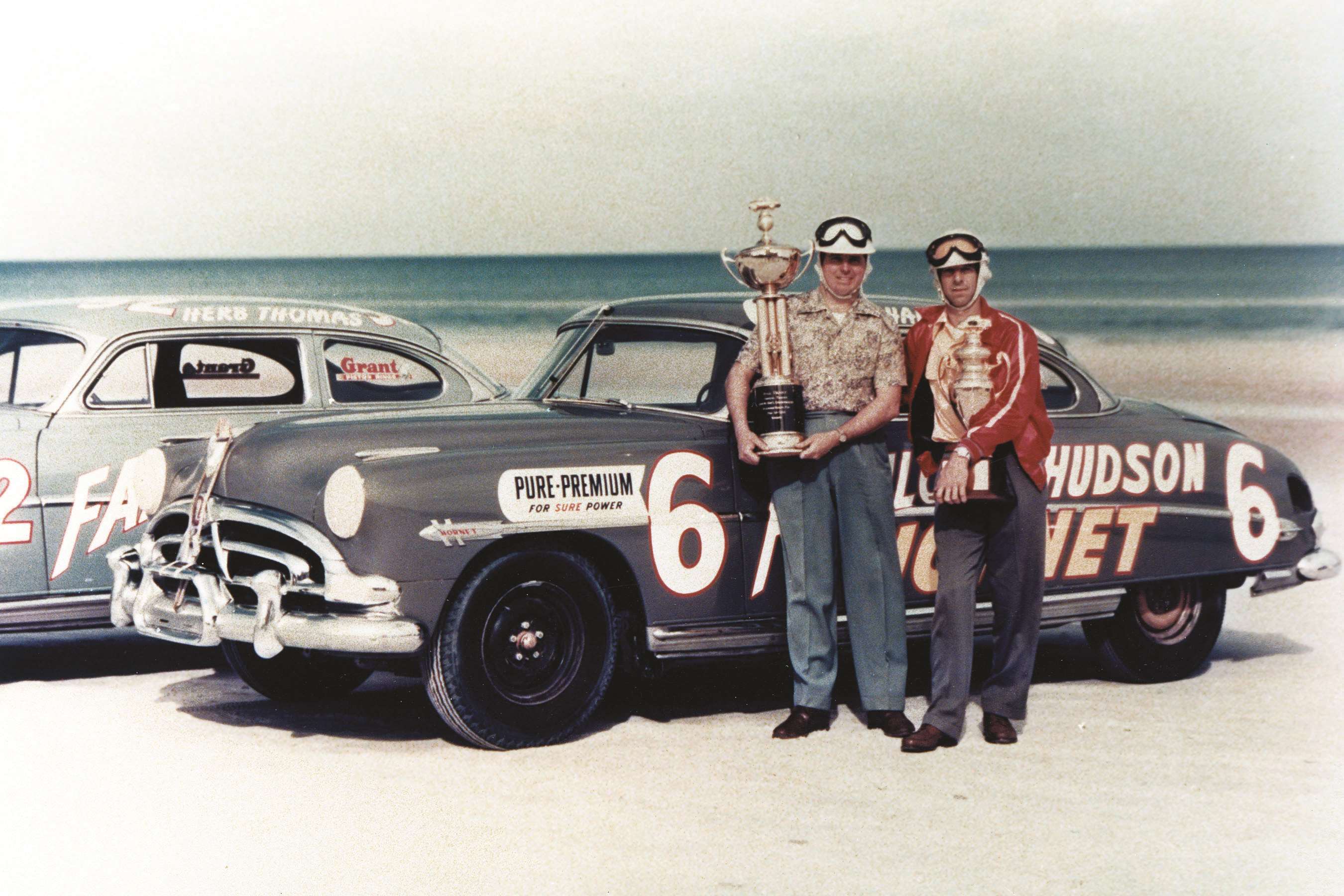 Drivers Marshall Teague and Herb Thomas pose at the Daytona Beach-Road Course in 1952