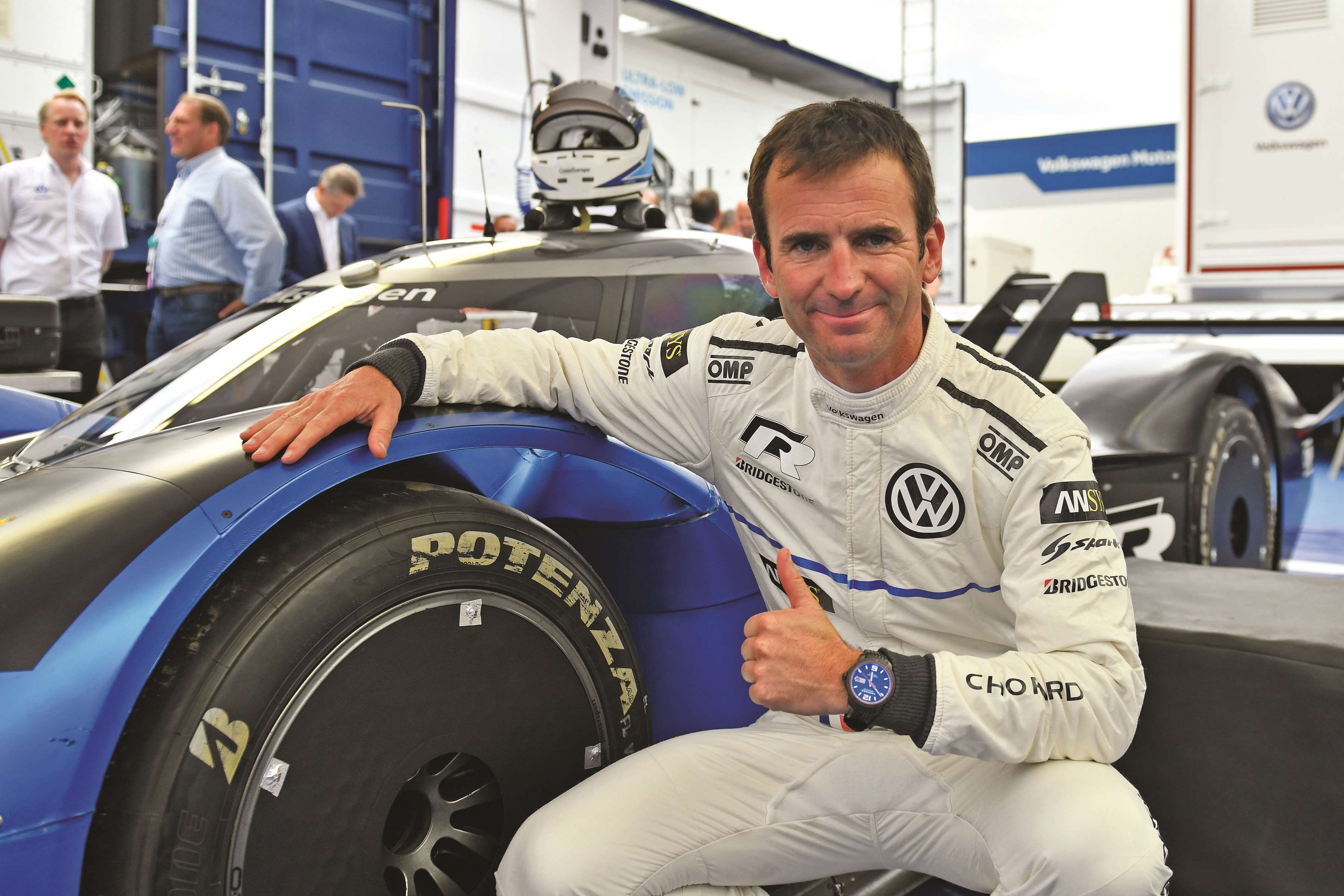 Romain Dumas with the Volkswagen ID R, the electric racing car that wowed spectators at the Goodwood hillclimb in July 2019