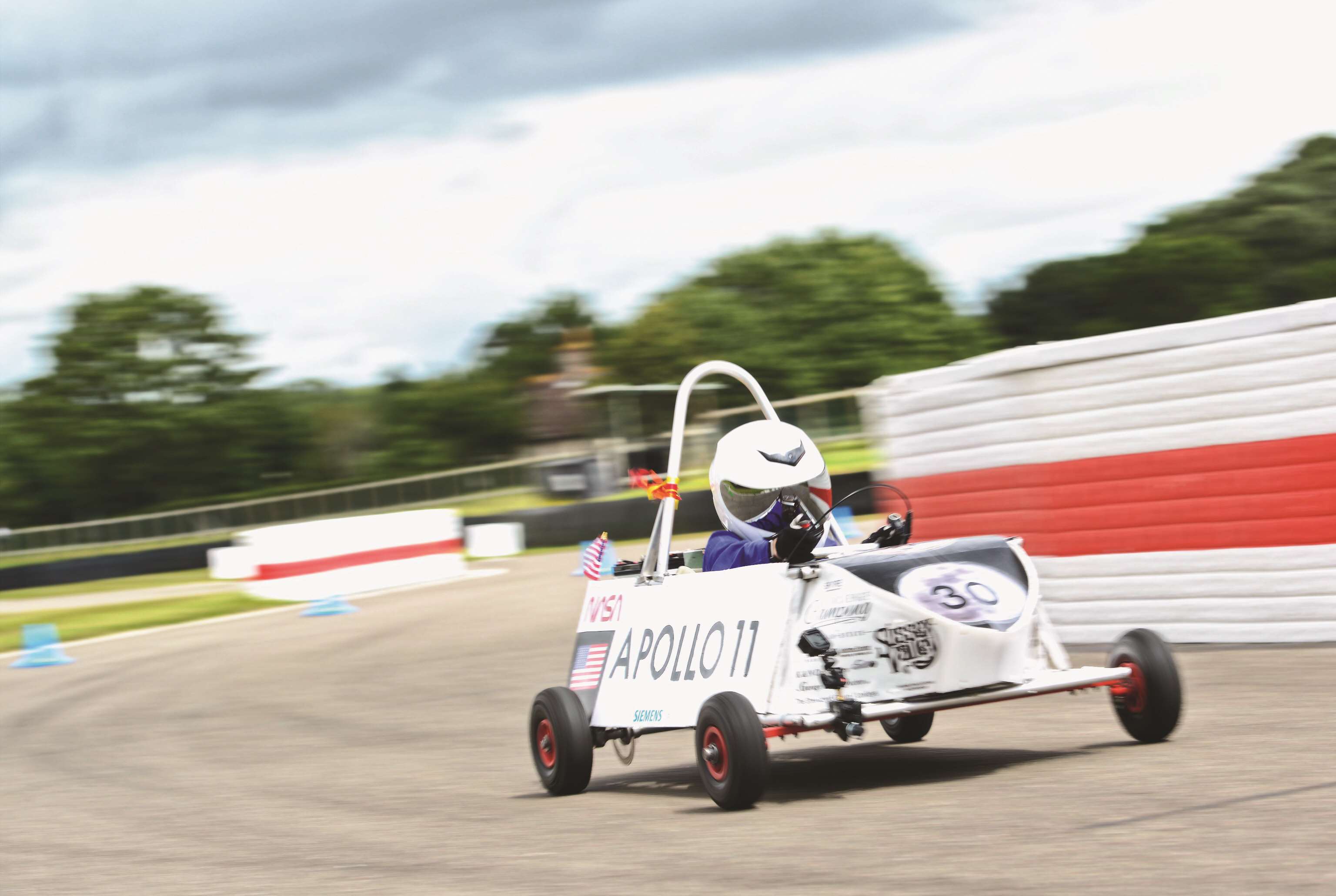 Amber Cleghorn-Blair at the wheel of Funtington’s Apollo 11-themed car